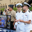 Military recruiters talking with students