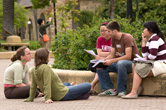 Group of students sitting and talking on the Quad