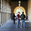 Students talking in the arcade of the Main Quad 