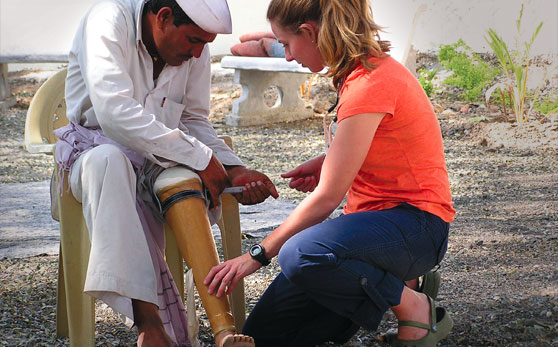 Stanford GSB student helping client of Jaipur Foot Organization in India