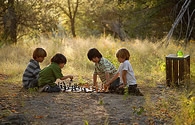 Children playing a board game.