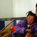 Image of chinese father and child waiting for health care