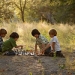 Children playing a board game.