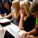 Students set up their donated laptop computers on the first day of school at Joplin High School in Joplin 