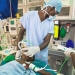 nurse attending a patient using Gradian equipment