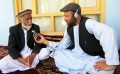 Masood Farivar ('12) conducts an interview for radio in Afghanistan