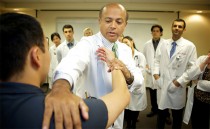 Dr. Abraham Verghese with patients.