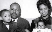 Michelle Obama as a baby with parents and brother