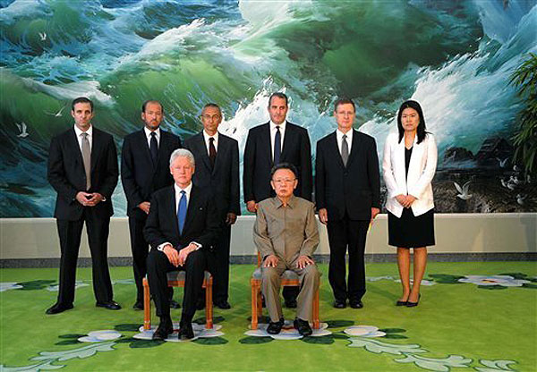 Former President Bill Clinton, North Korean leader Kim Jong Il seated. Standing behind, second from the right is David Straub, associate director of the Korean Studies Program in the Walter H. Shorenstein Asia Pacific Research Center.