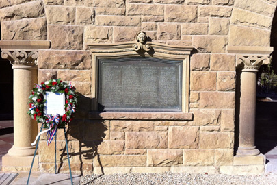 Wreath in front of plaque in Memorial Court / Photo: Elaine Enos