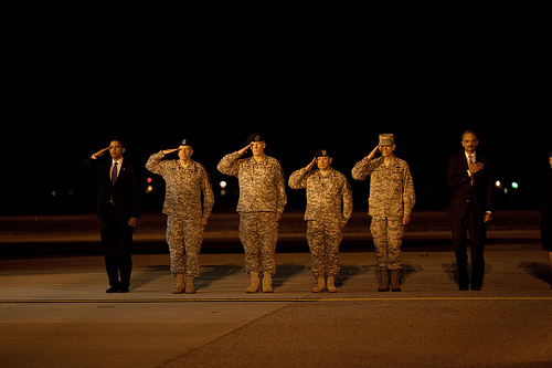 President Barack Obama attends a ceremony at Dover Air Force Base in Dover, Del., Oct. 29, 2009, for the dignified transfer of 18 U.S. personnel who died in Afghanistan. (Official White House Photo by Pete Souza)