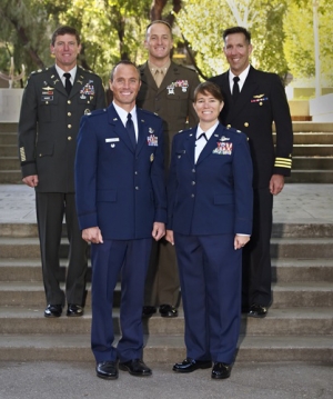 Front row, left to right: Lieutenant Colonel Leif Eckholm and Lieutenant Colonel Brenda Cartier, both U.S. Air Force Back row, left to right: Lieutenant Colonel Joseph “JP” McGee, U.S. Army; Lieutenant Colonel Minter Ralston, U.S. Marines; and Commander David Slayton, U.S. Navy