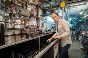 Photo – Accelerator physicist Cecile Limborg next to the X-band test accelerator