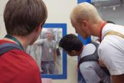 Photo - Students looking through an experimental hutch window at SSRL