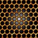 Image - CO molecules (black) guide electrons (yellowish) into honeycomb pattern