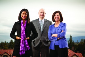 Photo of Gupta, Kramer, and Petersilia, standing and smiling